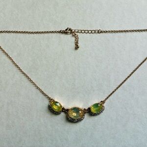 Elegant Gold Necklace with Yellow-Green Accents